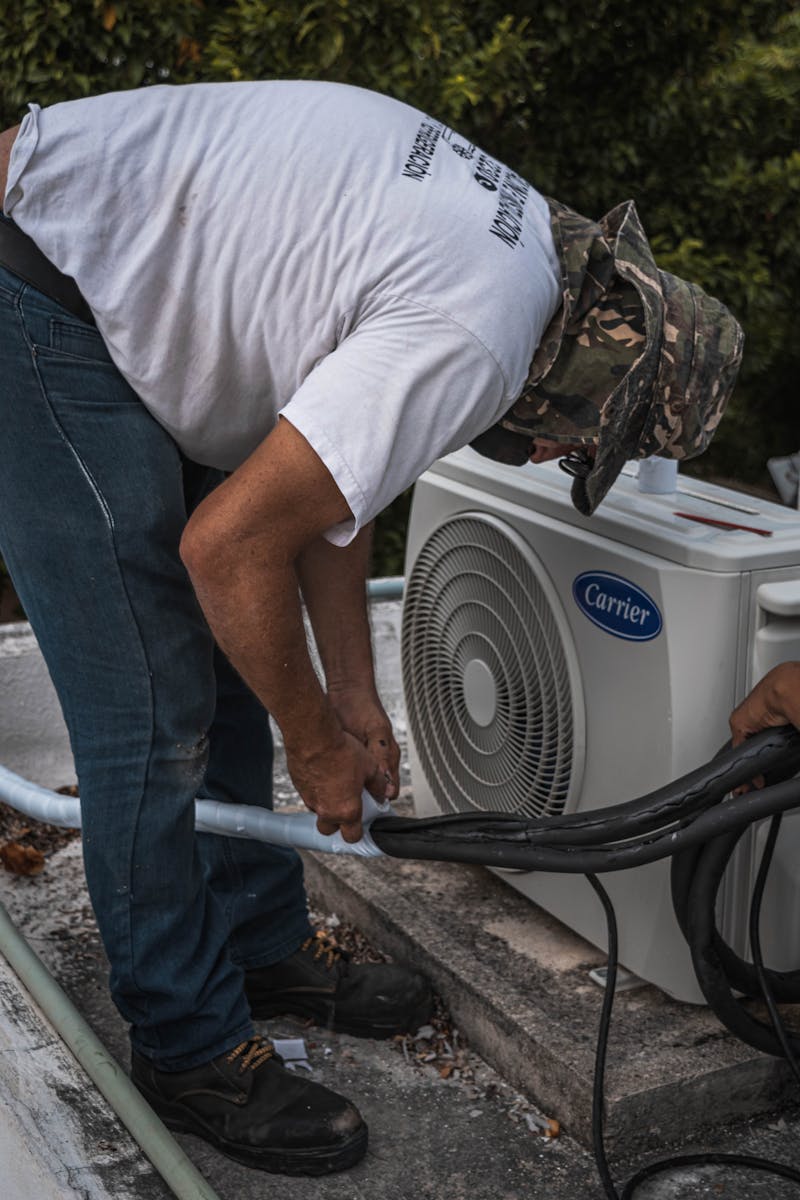 HVAC air conditioning unit outside a home for spring maintenance servicing
